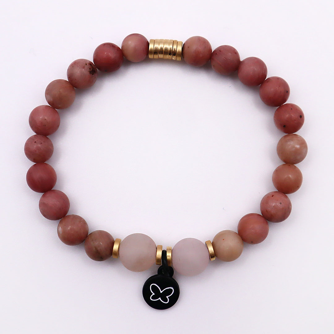 rosie pink bracelet with gold accent and butterfly charm
