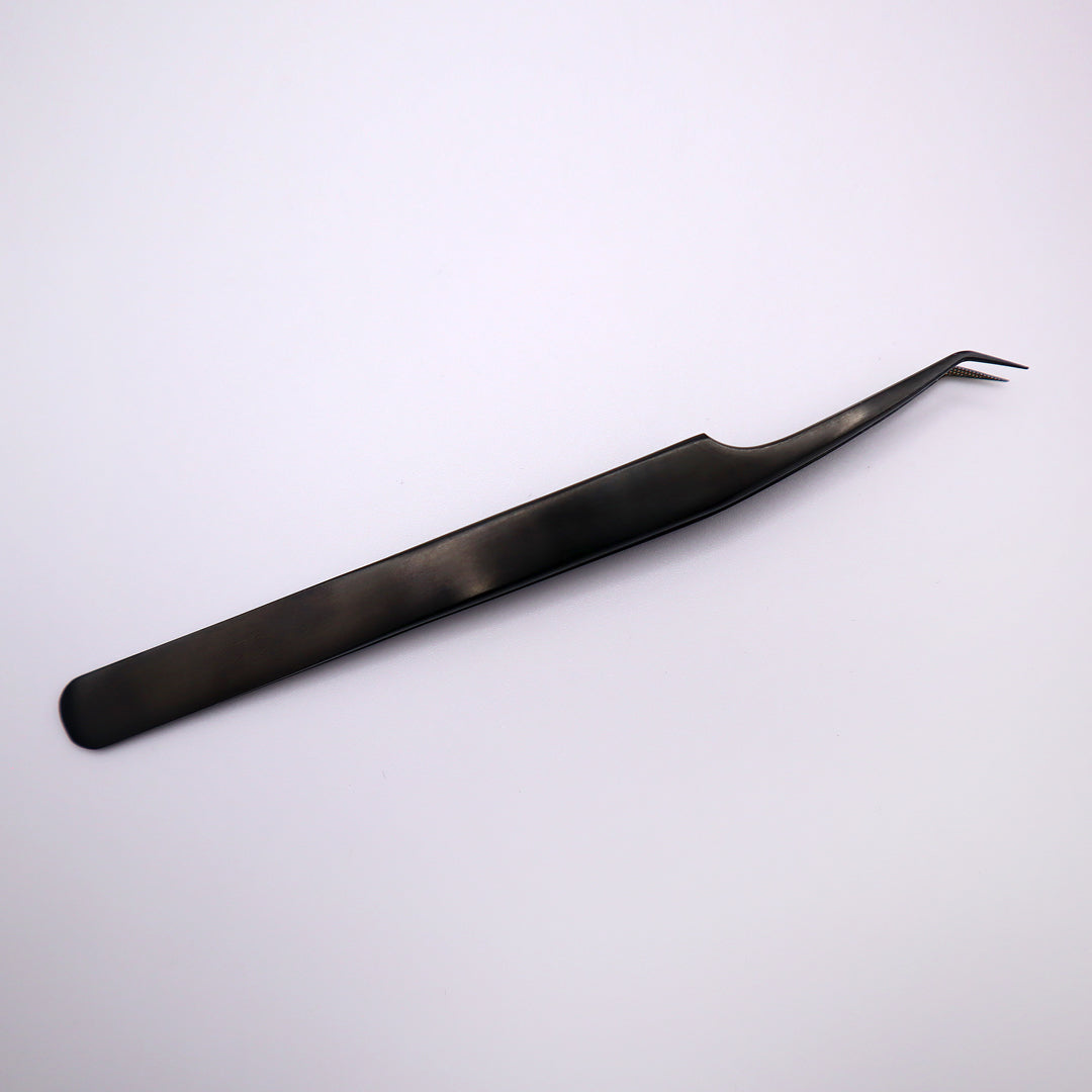 back of black fiber tip slanted tweezer