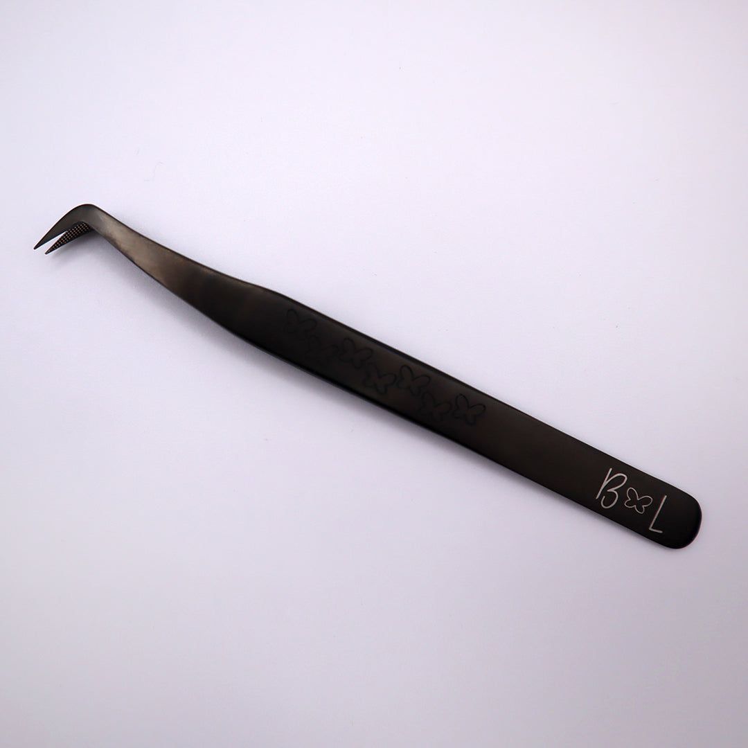 black fiber tip tweezer boot shaped