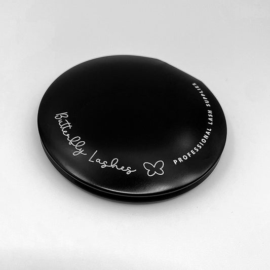 round black compact mirror