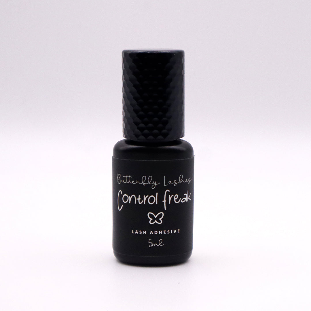 5ml black bottle of control freak adhesive