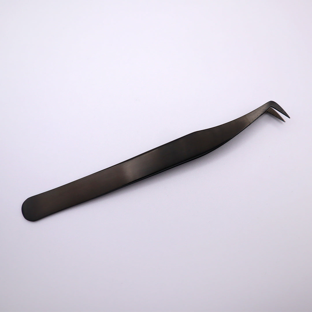 black boot shaped tweezer