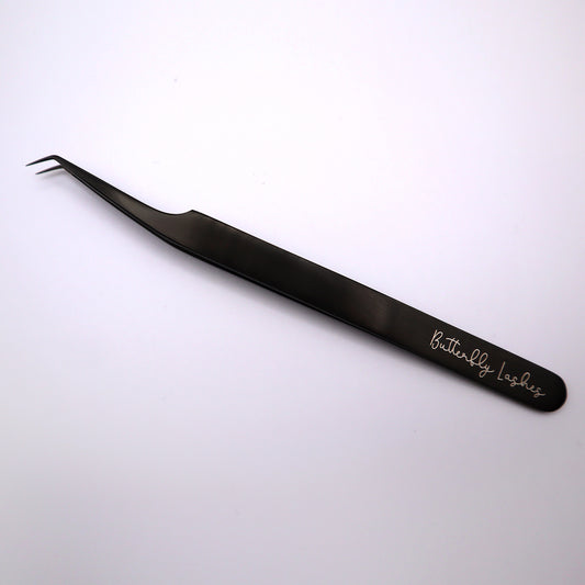 black slanted fiber tip tweezer with butterfly lashes logo